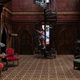 A small girl climbs a spiral staircase in a large library in Netflix's Haunting of Hill House.